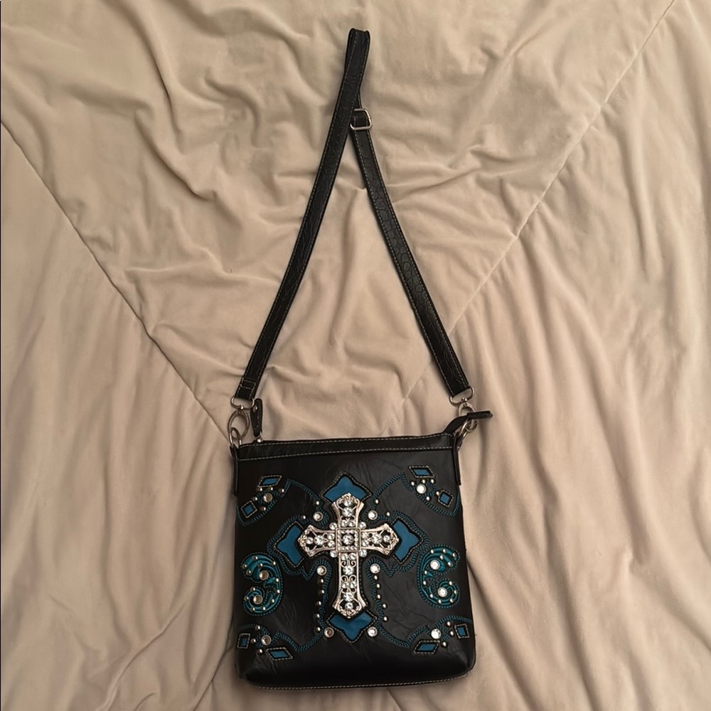 Black Crossbody Bag with Ornate Cross and Turquoise Studs